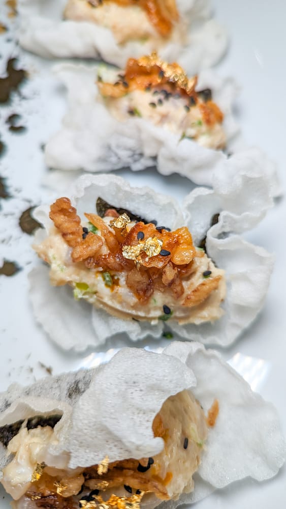 Rainbow runner tartare on rice clouds