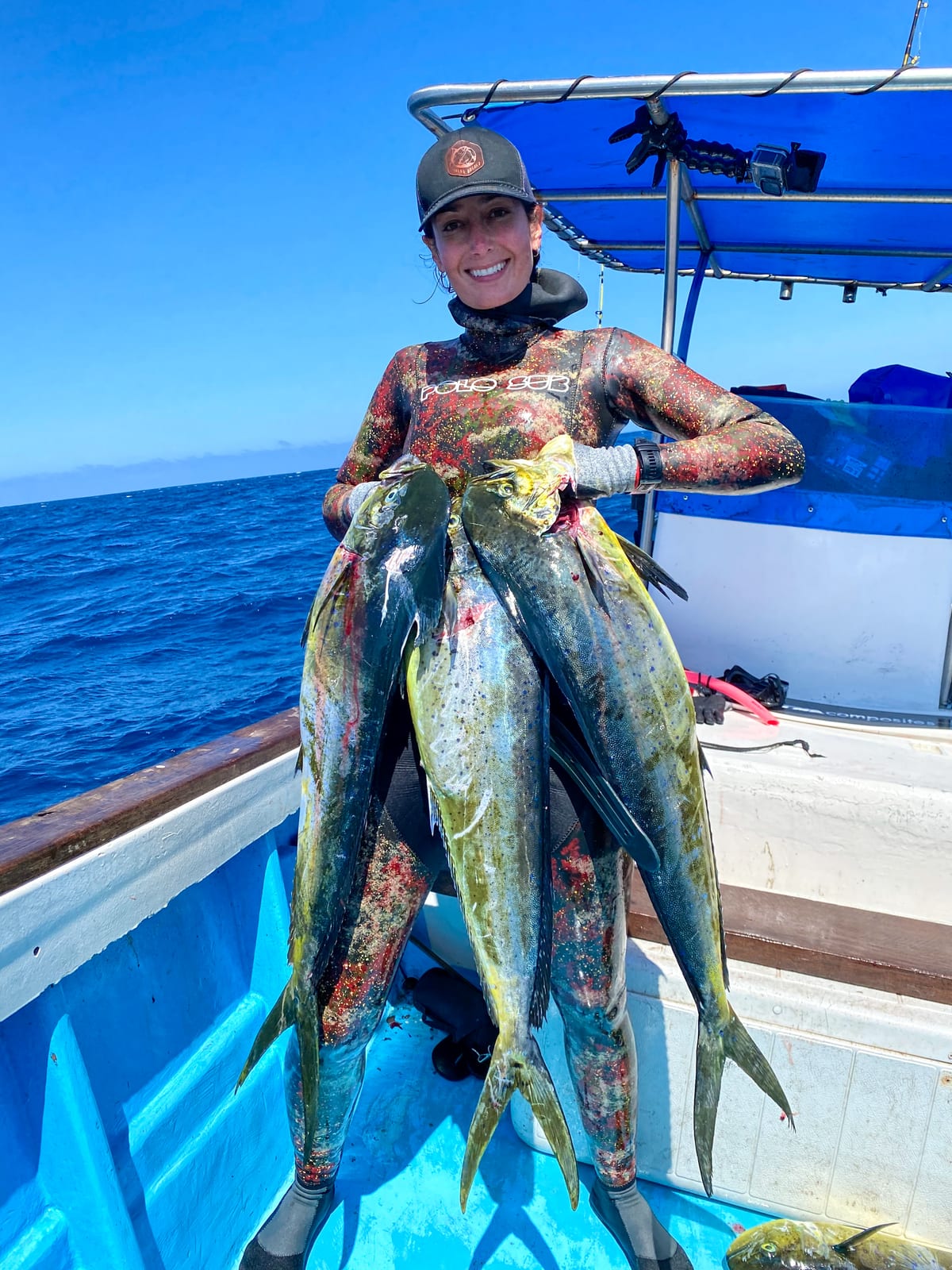 Lauren Sarasua in Ecuador with mahi mahi she shot while bluewater drifting