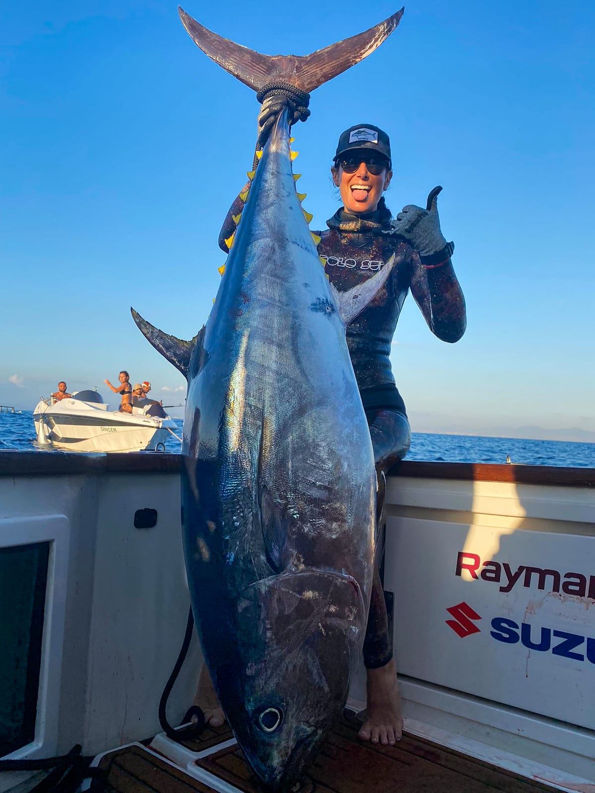 Lauren Sarasua on the boat with a big tuna