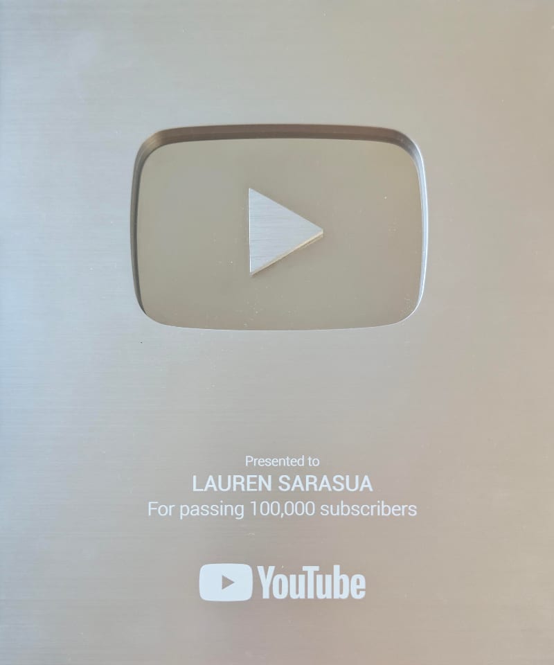YouTube Silver Creator Award presented to Lauren Sarasua for passing 100,000 subscribers